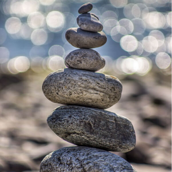 Image of rocks stacked up on the back from large to tall