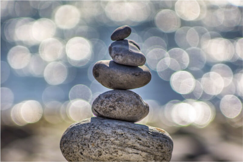 Image of rocks stacked up on the back from large to tall